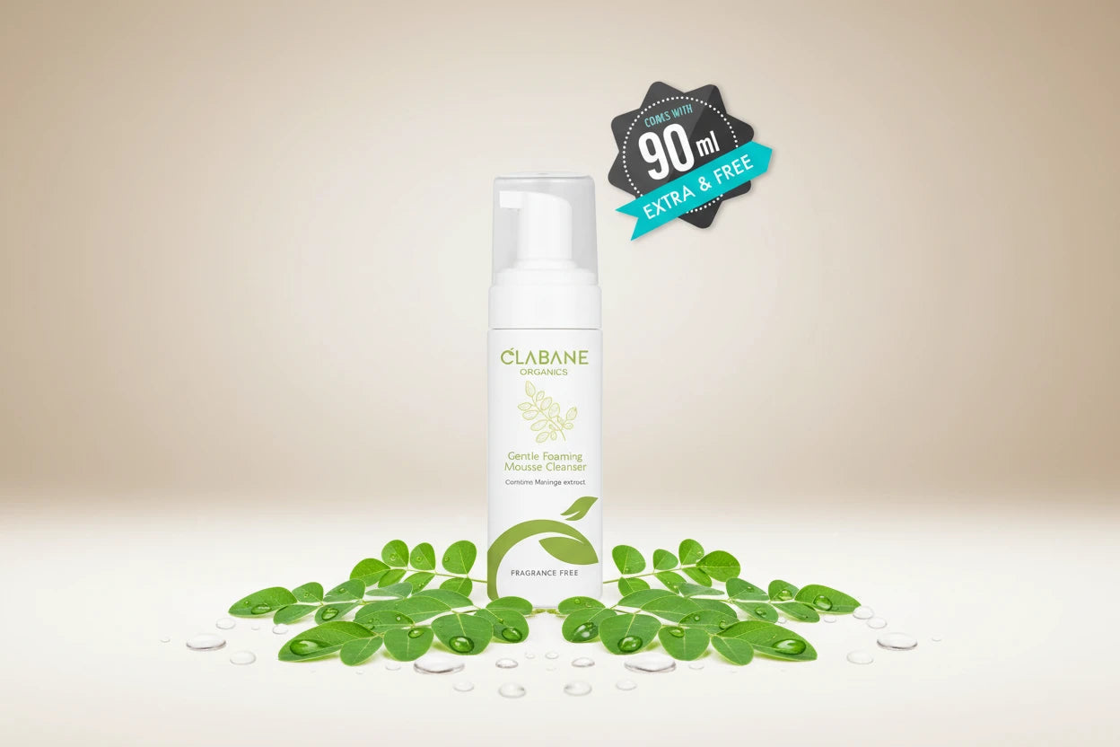 A pump bottle of Clabane Organics Gentle Foaming Mousse Cleanser with a label indicating 90 ml size and organic certification.