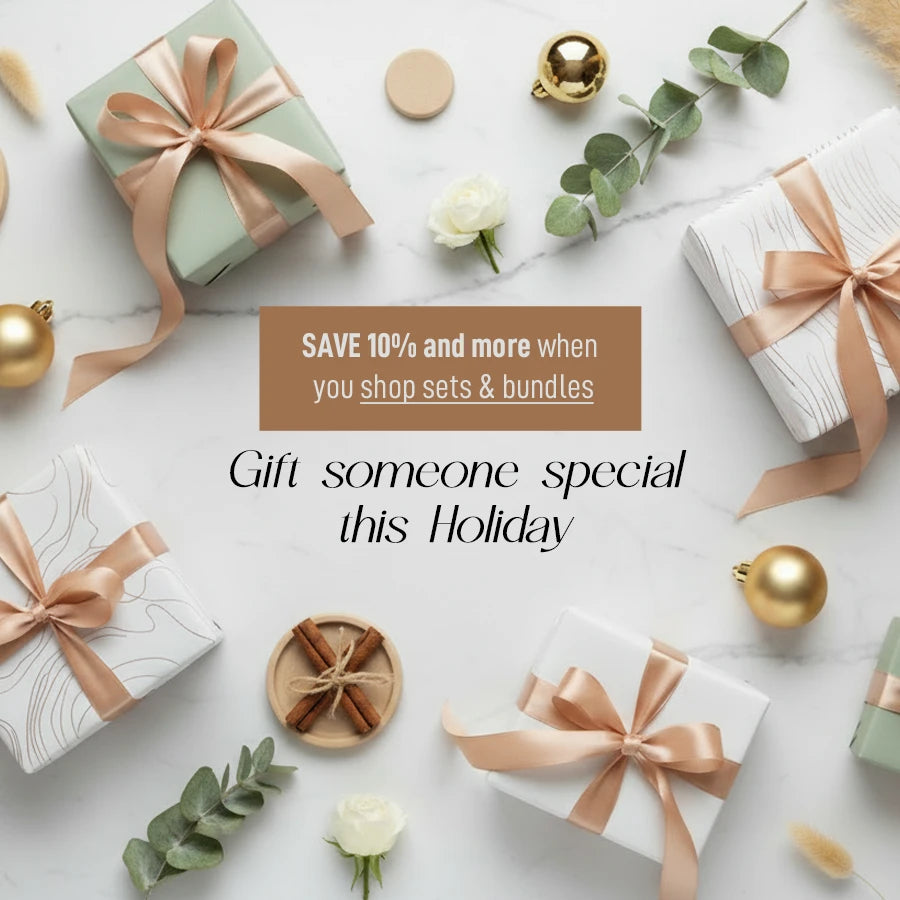 Gift boxes with ribbons and holiday decorations on a white surface, Gift someone special this holiday with Clabane