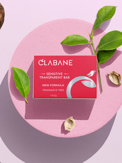 Clabane soap bar packaging with green leaves on a pink background